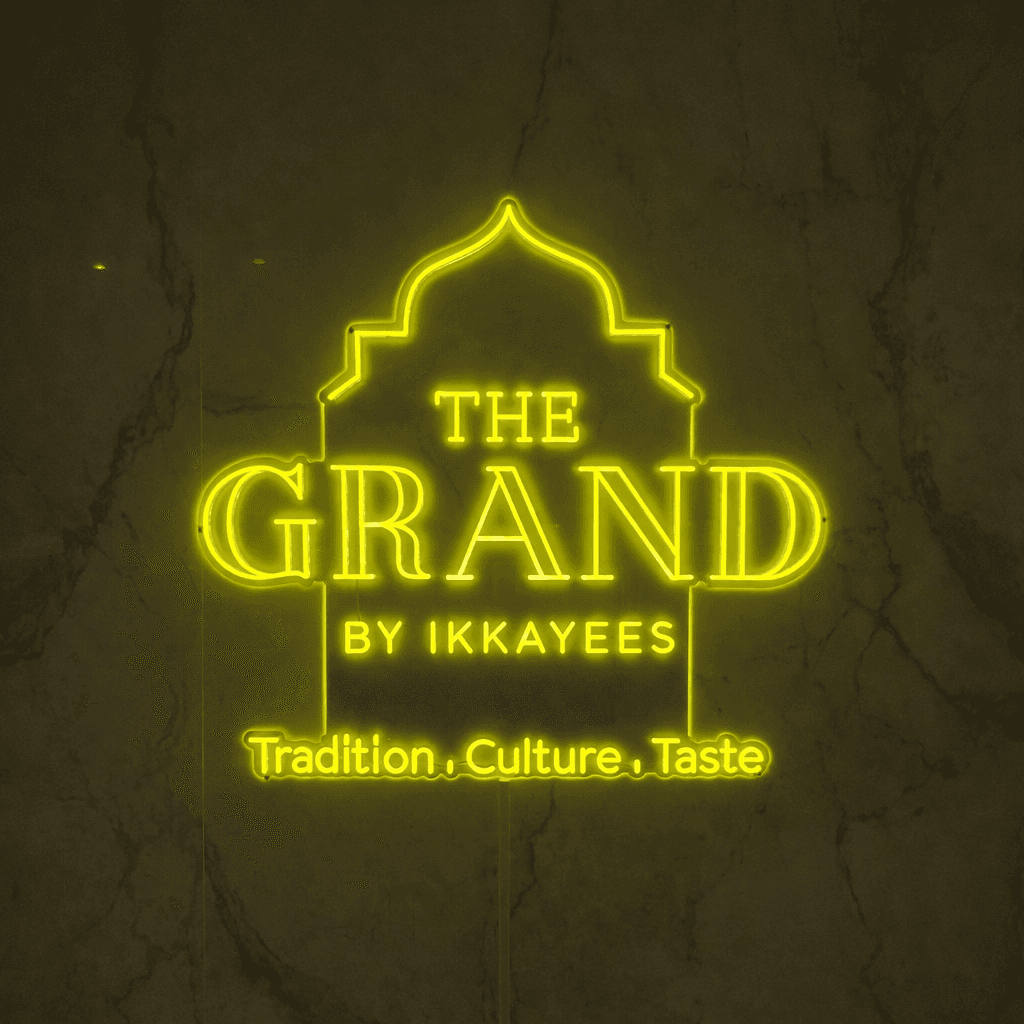 The Grand restaurant neon sign