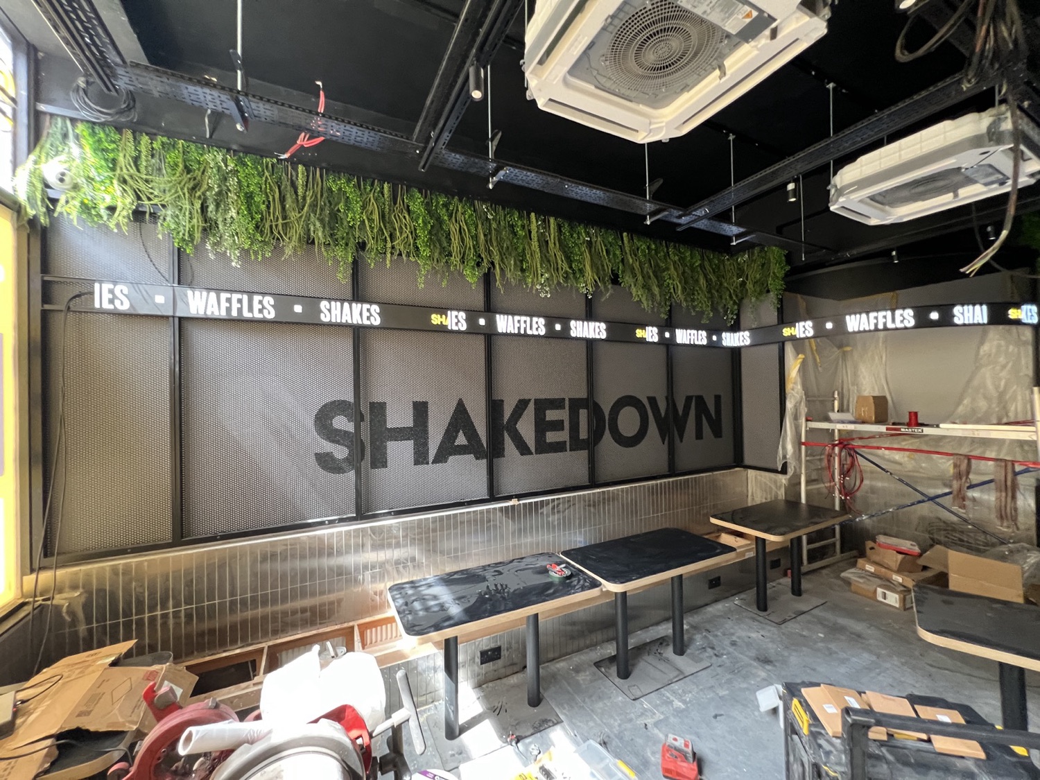 A Neon Guys Digital LED ticker installed and lit at Shakedown